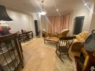 a living room with a couch and a table at 2 Bedroom New Flat In Blackpool Town Center in Blackpool