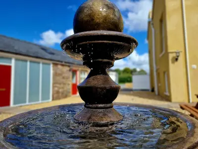 a close up of a water fountain at The Hamilton - The Studio luxury holiday let's in Scorton
