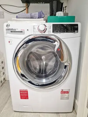 a white washer and dryer in a room at Liverpool Baltic Flat in Liverpool