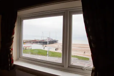 a window with a view of the beach at Viking Hotel - Adults Only in Blackpool