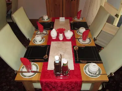 a table with a red table cloth on top at The Middleton in Blackpool