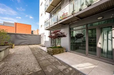 an empty courtyard in front of a building at Host & Stay - Henry Street Chambers in Liverpool