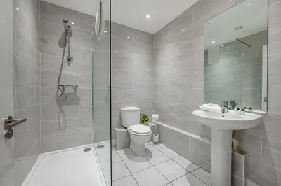 a bathroom with a toilet and a sink and a shower at Host & Stay - Henry Street Chambers in Liverpool