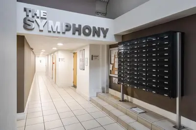 a sign for the subway showroom in a building at Kinetic Stays - Symphony Building in Liverpool