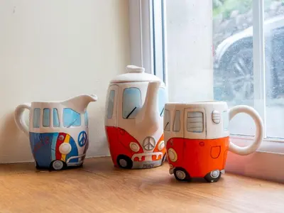 a group of three vases sitting on a table at Quaint Cottage Retreat in Charming Ulverston - Pass the Keys in Ulverston