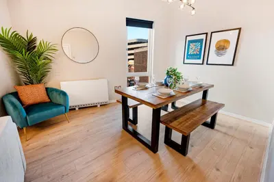 a living room with a table and a chair at Host & Stay - Ropewalks Quarters in Liverpool