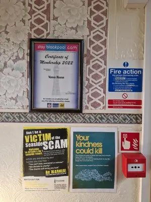 a group of posters on a wall at Vance House in Blackpool