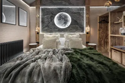 a bedroom with a large bed with a moon mural at Coronation Cottages, Modernised 200-Year-Old Lake District Cottage Getaway for Two - Ridgestone in Lindale