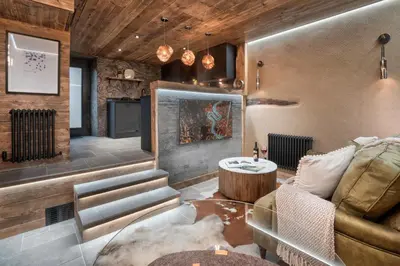 a living room with a couch and a table at Coronation Cottages, Modernised 200-Year-Old Lake District Cottage Getaway for Two - Ridgestone in Lindale