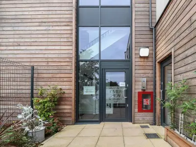 an entrance to a building with a glass door at River View in Preston