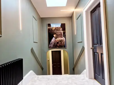 a hallway with a picture on the wall at Hamilton-The Alexander suite luxury holiday Let's in Scorton