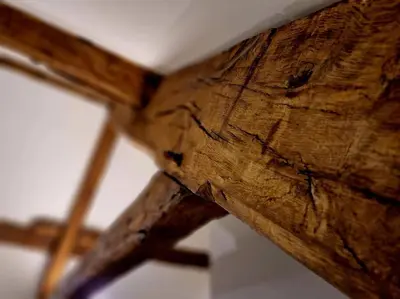 a close up of a wooden beam on a table at Hamilton-The Cruck Luxury Let in Scorton