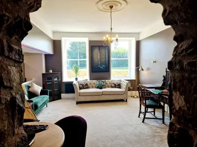 a living room with a couch and a window at Hamilton - Lord William in Scorton