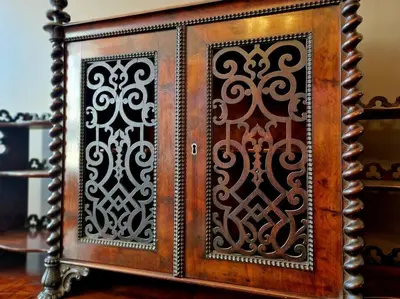a pair of wooden doors with black and white designs at Hamilton - Lord William in Scorton