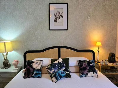 a bedroom with a bed with two pillows at Windmill House LYTHAM in Lytham St Annes