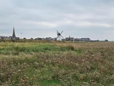 a windmill in the middle of a field at Windmill House LYTHAM in Lytham St Annes