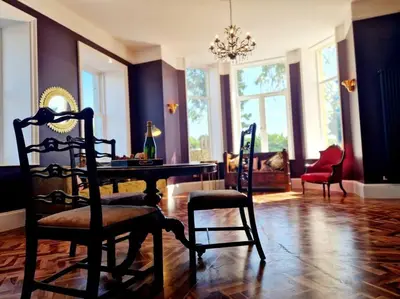 a living room with a table and two chairs at The Hamilton Luxury Let-The Duke in Scorton