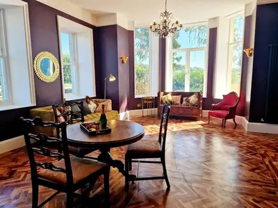 a living room with a table and chairs at The Hamilton Luxury Let-The Duke in Scorton