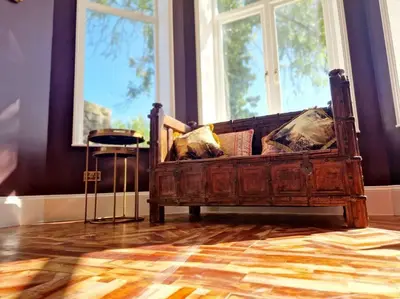 a couch sitting in a room with windows at The Hamilton Luxury Let-The Duke in Scorton