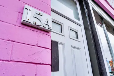 a house with a number on the side of it at Modern 2 bedroom flat - 15 minutes to Liverpool in Birkenhead