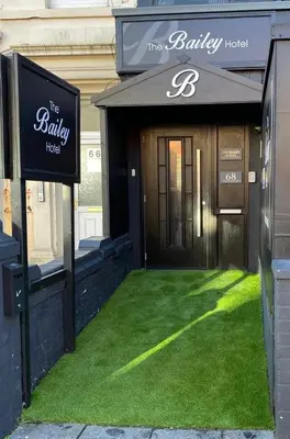 a building with a sign that reads the belly hotel at The Bailey Hotel Blackpool in Blackpool