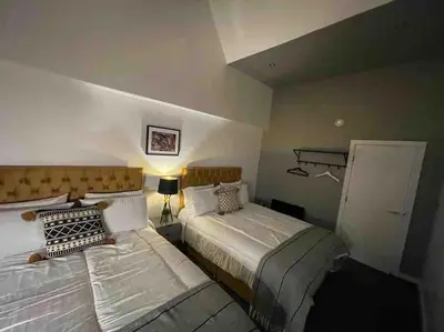 a bedroom with two beds in a room at Fantastic Liverpool City Centre Apartments, Fenwick Street in Liverpool