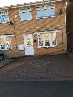 a brick building with a white door and windows at LIVERPOOL HOME with FREE PARKING in West Derby