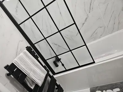 a bathroom with a towel rack and a bath tub at Clifton House, For Holidays, Contractors, Relocation, Work, Etc, Free Parking and Wifi in Preston