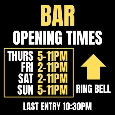 a sign that says bar operating times with an arrow at Hotel Neon in Blackpool