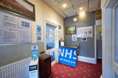 a room with a nhs sign on the wall at The Wilton International in Blackpool
