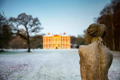 a statue in a park with a building in the background at Lytham Hall Gate House in Lytham St Annes