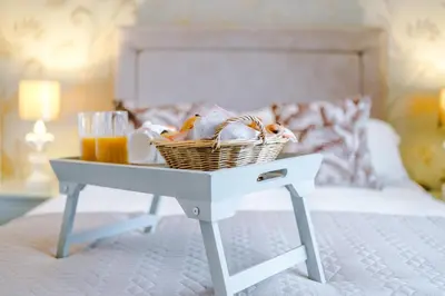 a basket on a table in a bedroom with a bed at The Knoll Lodge- Beautiful Luxurious One Double Bedroom Property in Farington