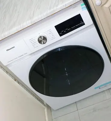 a white microwave oven sitting on top of a counter at The Oasis - For Contractors and Individuals in Wigan