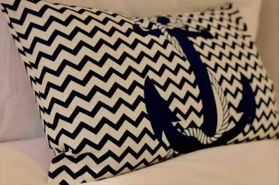 a black and white bag sitting on a couch at Riverside House Lancaster - 2 bedroom house in Lancaster
