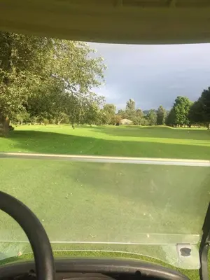a view of a golf course from a car window at Haven Lakeland 3 Bed Luxury Caravan in Flookburgh