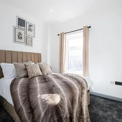 Deluxe Bolton Cinema House 2BR Modern Retreat with Free Parking