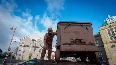 a statue of a man standing on the back of a truck at Apartment 1 West County by Prestige Properties SA in Millom