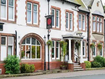 a building with a sign on the front of it at The County Hotel by Innkeeper's Collection in Lytham St Annes