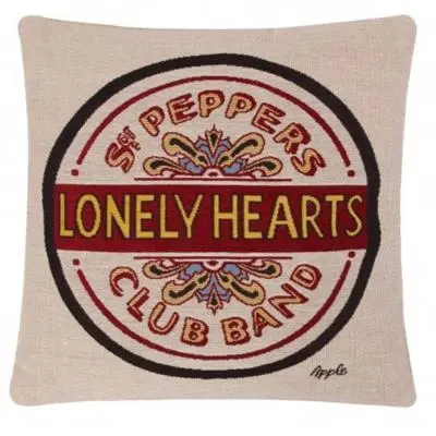 a towel with a sign that reads leggy hearts unhappy bakery at Beatles Apartment in Liverpool