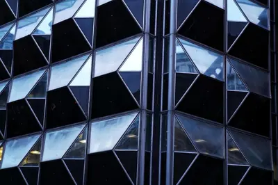 a close up of a glass skyscraper facade at Beatles Apartment in Liverpool