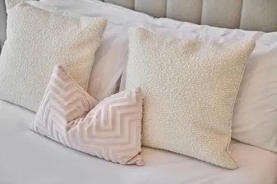 a group of pillows on a bed at Host & Stay - The Municipal View Abode in Liverpool