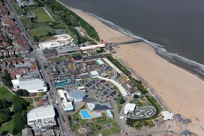 an aerial view of a beach and the ocean at Alumhurst Hotel in Blackpool