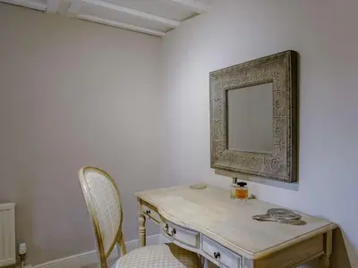 a room with a table and a mirror on the wall at 3 Bed in Grange-over-sands oc-66725 in Holker