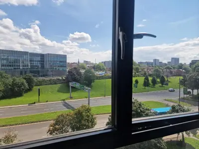 an open window with a view of a street at Westminster Luxury Liverpool Apartment with Free Parking in Liverpool