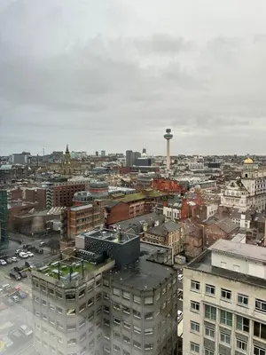 an aerial view of a city with a control tower at Stunning City View Apartment by Central Stay in Liverpool