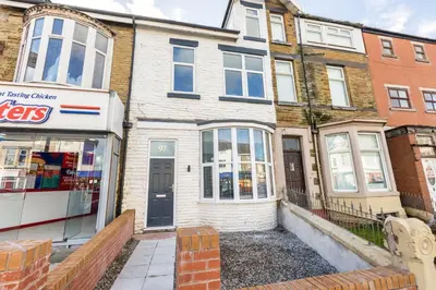 an empty street in front of a house at Ettie's in Blackpool