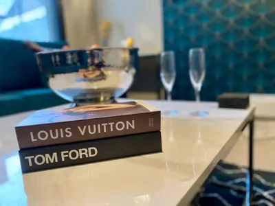 a bowl and two wine glasses on a table at Entire Modern House Liverpool, 6 Bedrooms in Liverpool