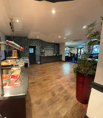 an empty room with a buffet line in a restaurant at Royal Clifton Hotel in Southport
