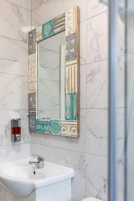 a white bathroom with a sink and a mirror at Flatzy - Modern 3 Bedroom Home in City Centre in Liverpool