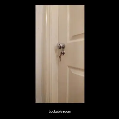 a white door with a silver door knob on it at Large Studio Room in City Centre (Shared Bathroom) in Preston